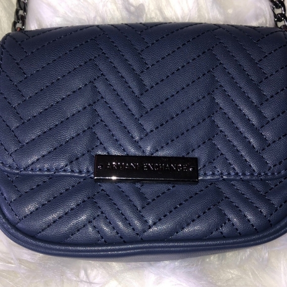 Armani Exchange navy cross body bag
$58 $0 - Picture 2 of 7